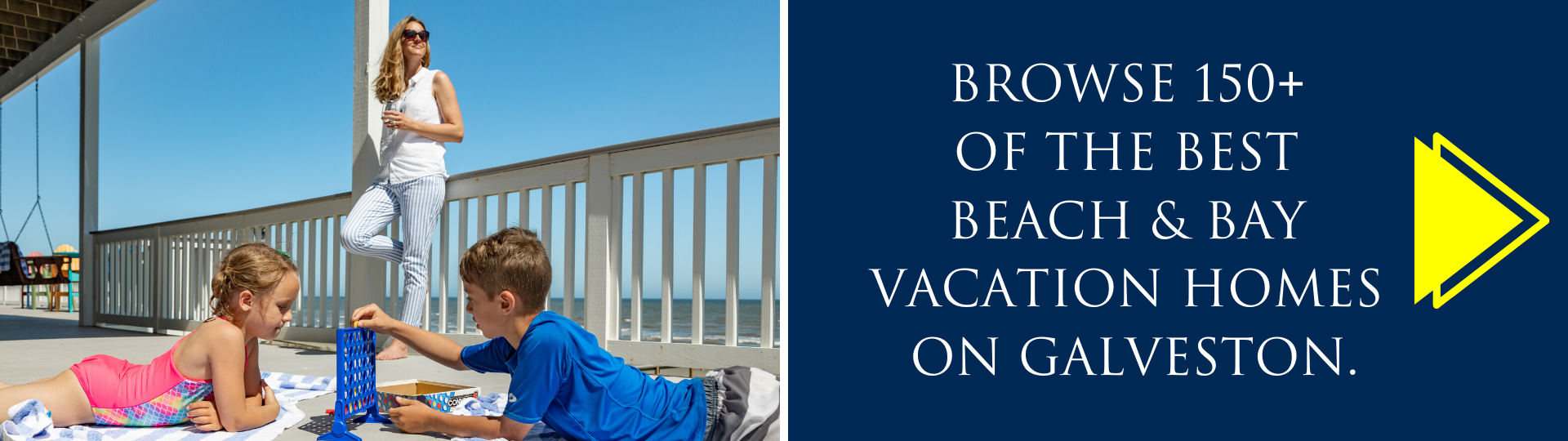 Boy and girl playing games on deck of Galveston Island vacation home.